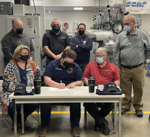 New employee signing day at Magna Machine and Tool